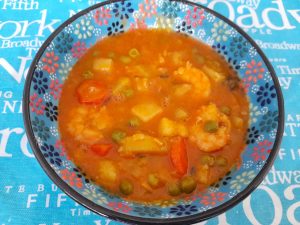Curry de langostinos con verduras